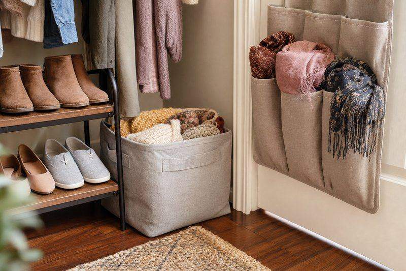 An organized closet with zoned shelves for shoes, bags, and stacked bins above the hanging rod — AI-generated image