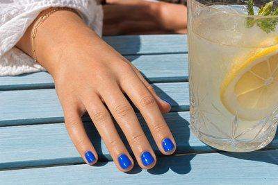 Bold Short Blue Nail Designs for Summer — AI-generated image